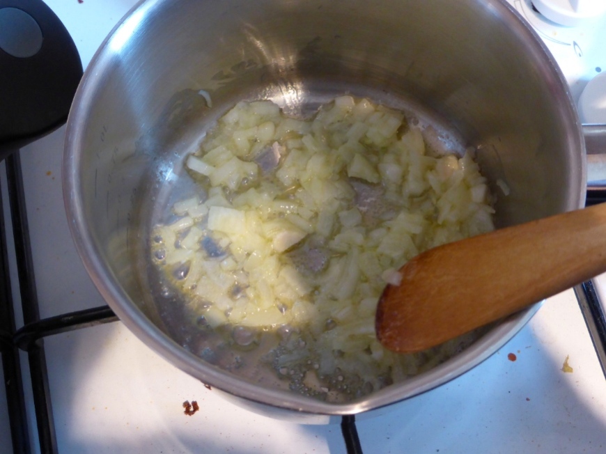 Sweating the onions for the asparagus tagliatelle.
