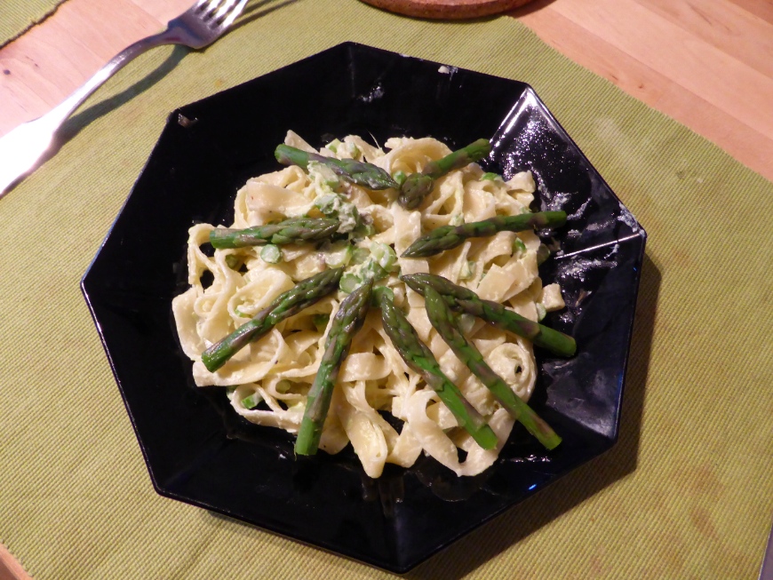 Asparagus tips on tagliatelle with sauce for the asparagus tagliatelle.